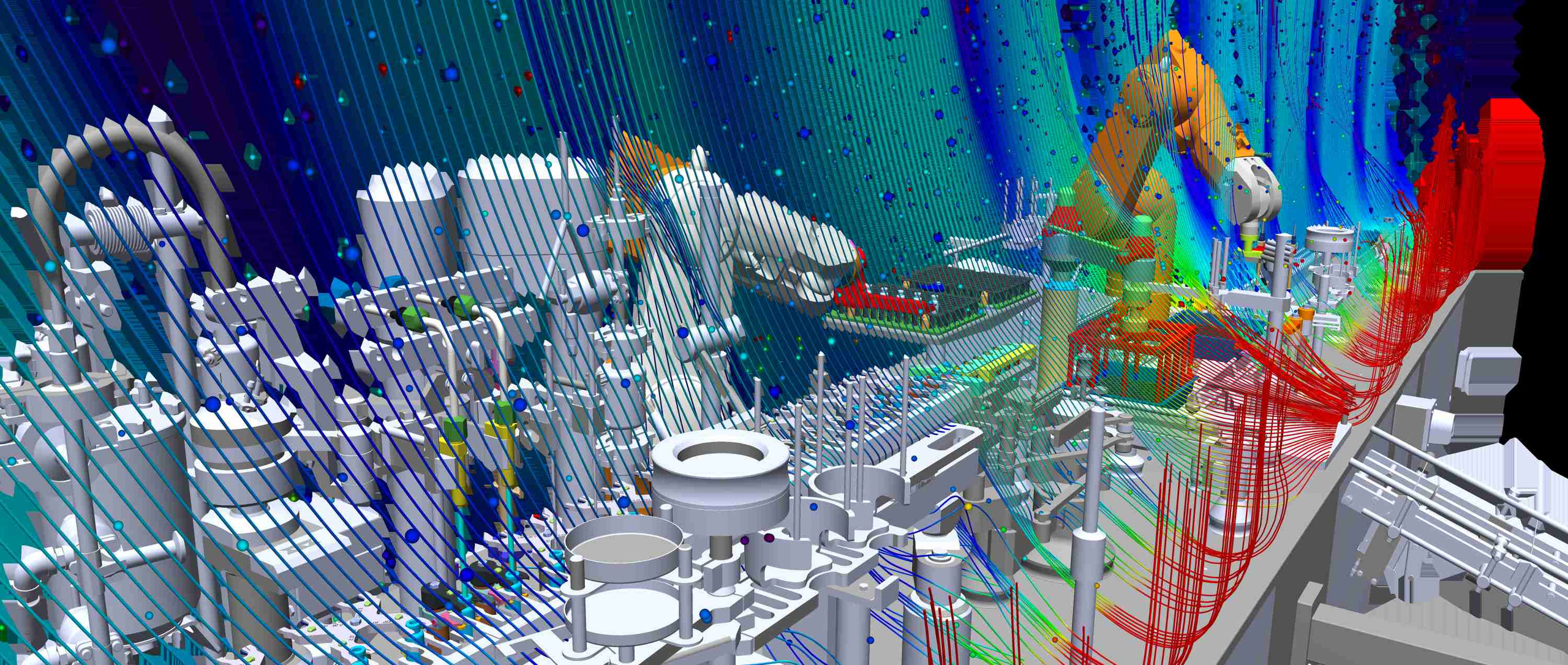 <p>Man sieht: Eine komplexe 3D-Computersimulation einer Industrieanlage mit Maschinen und einem orangefarbenen Roboterarm. Über das graue CAD-Modell ist eine bunte Strömungsvisualisierung gelegt: Zahlreiche geschwungene Linien in Blau-, Grün- und Rottönen zeigen den Verlauf von Luftströmen, ergänzt durch viele kleine blaue Partikelpunkte im Raum.<p>
