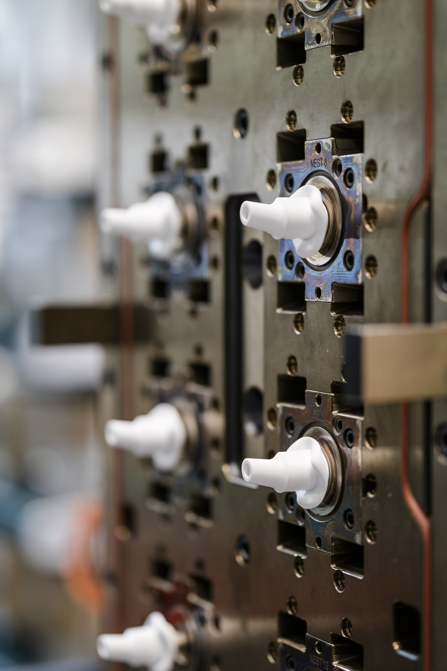 Spritzgusswerkzeug mit Mundstücken