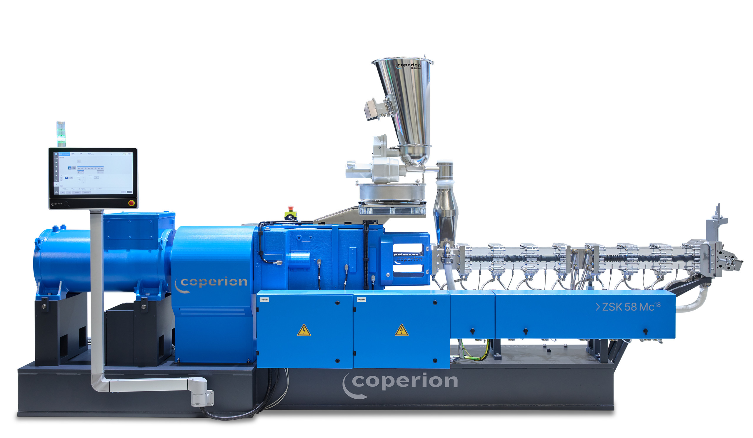 s Bild zeigt einen Doppelschneckenextruder der Reihe ZSK 58 Mc¹⁸.